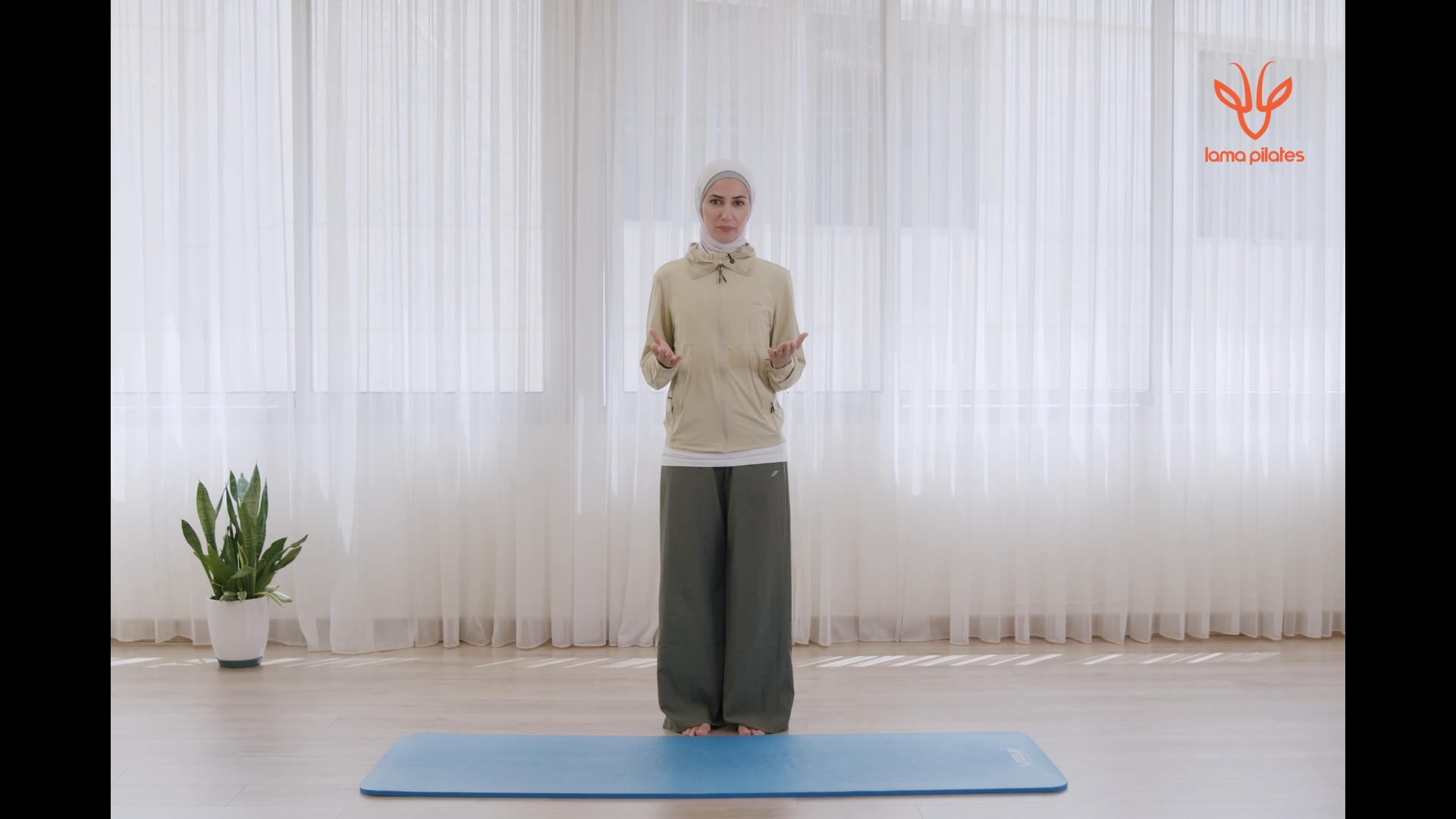 Lama teaching Pilates in episode 9